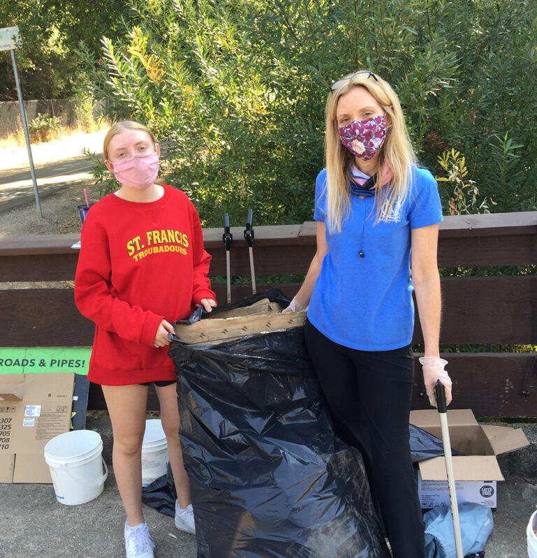 CarolynFamilyR-768x799 Carolyn and her daughter participate in the American River Conservancy’s clean-up day.