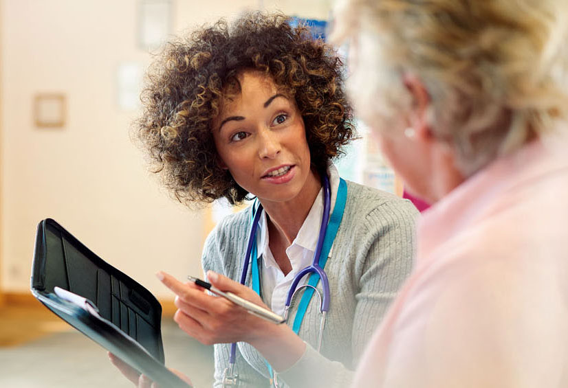 Hero-doctor-a-waiting-room-talking-to-patient " "